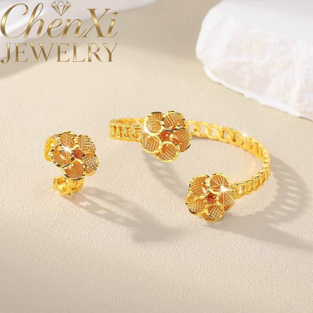 Sandgold-Blumen-Armreif und Ri – Coordinates Bracelet Bewertung und Preis